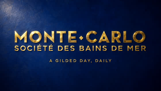 Gold Monte-Carlo lettering on deep blue with the line a gilded day daily